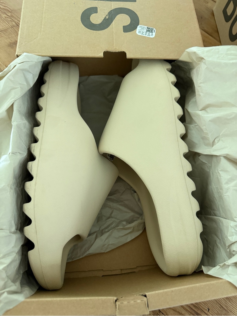 adidas Yeezy Slide “Bone” from the 2022 release in men’s size 13.